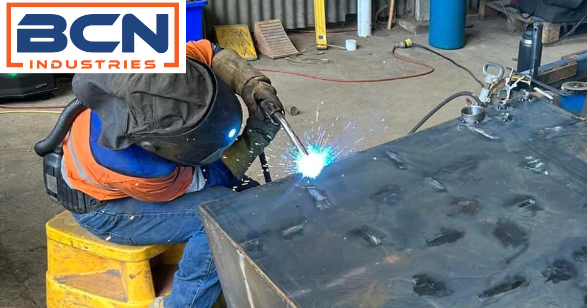 Fabrication process of a heavy-duty tank for a truck, highlighting robust construction and meticulous attention to detail