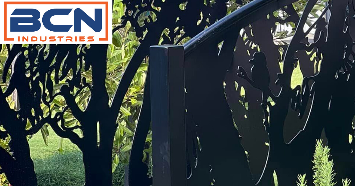 Tidy walkway bridge over the garden, adding charm and functionality to the landscape at BCN Industries